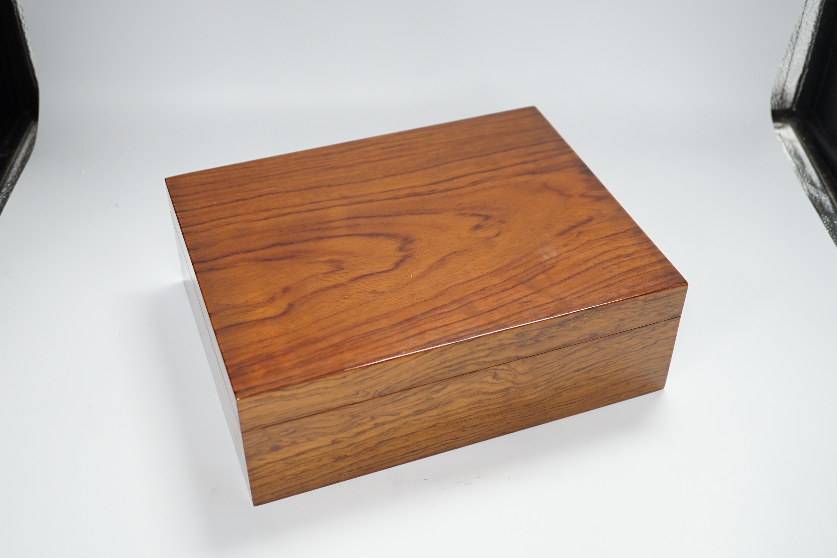 A modern wooden humidor with inset humidity measure, 29cm x 23cm x 9.5cm